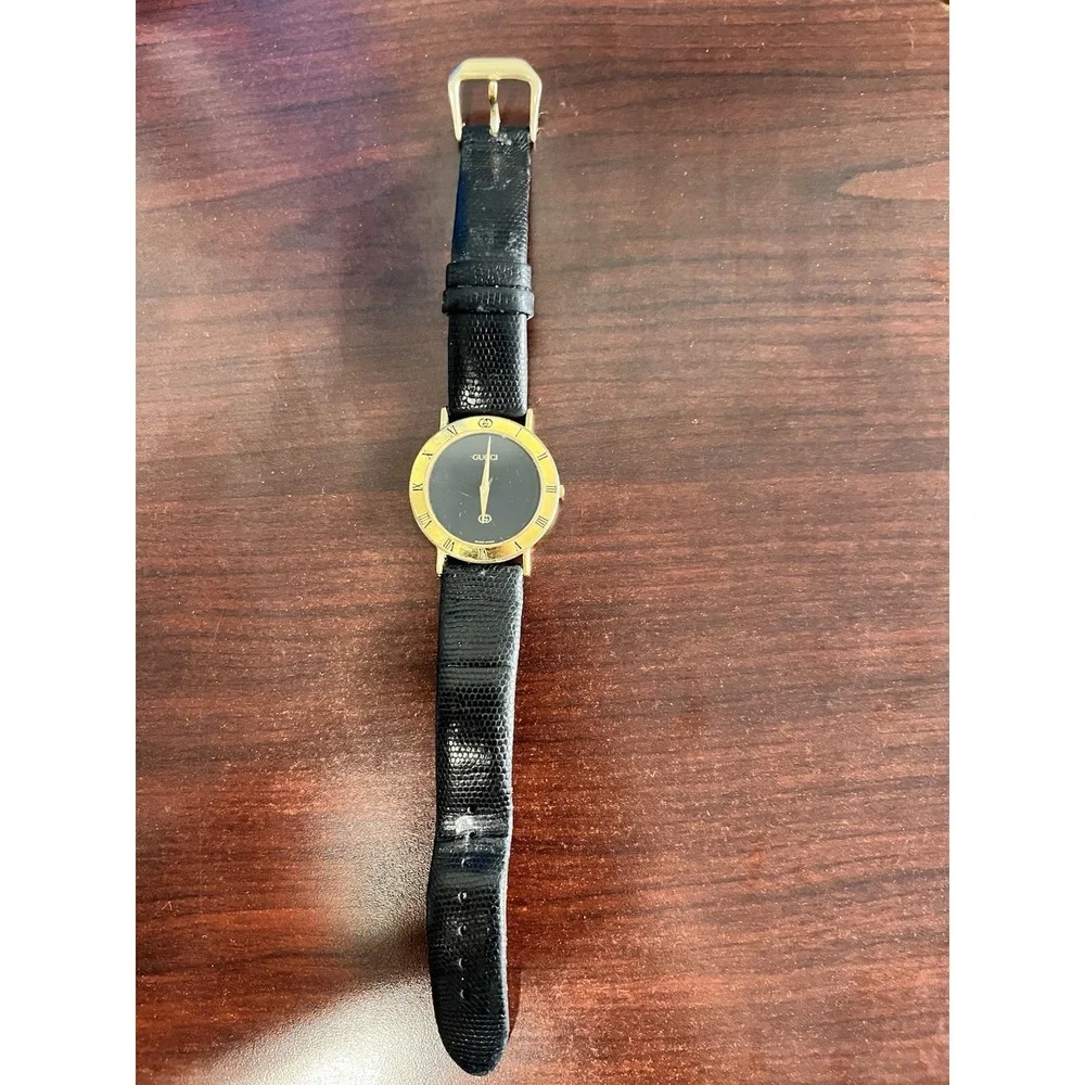 Gucci Model 3000 M Swiss Made Gold Plated Black Leather Men's Analog Dress Watch
